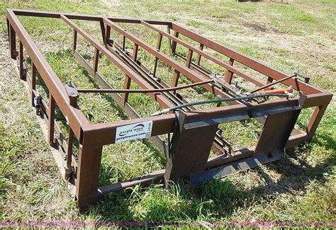 square bale loader for skid steer|pull behind square bale accumulator.